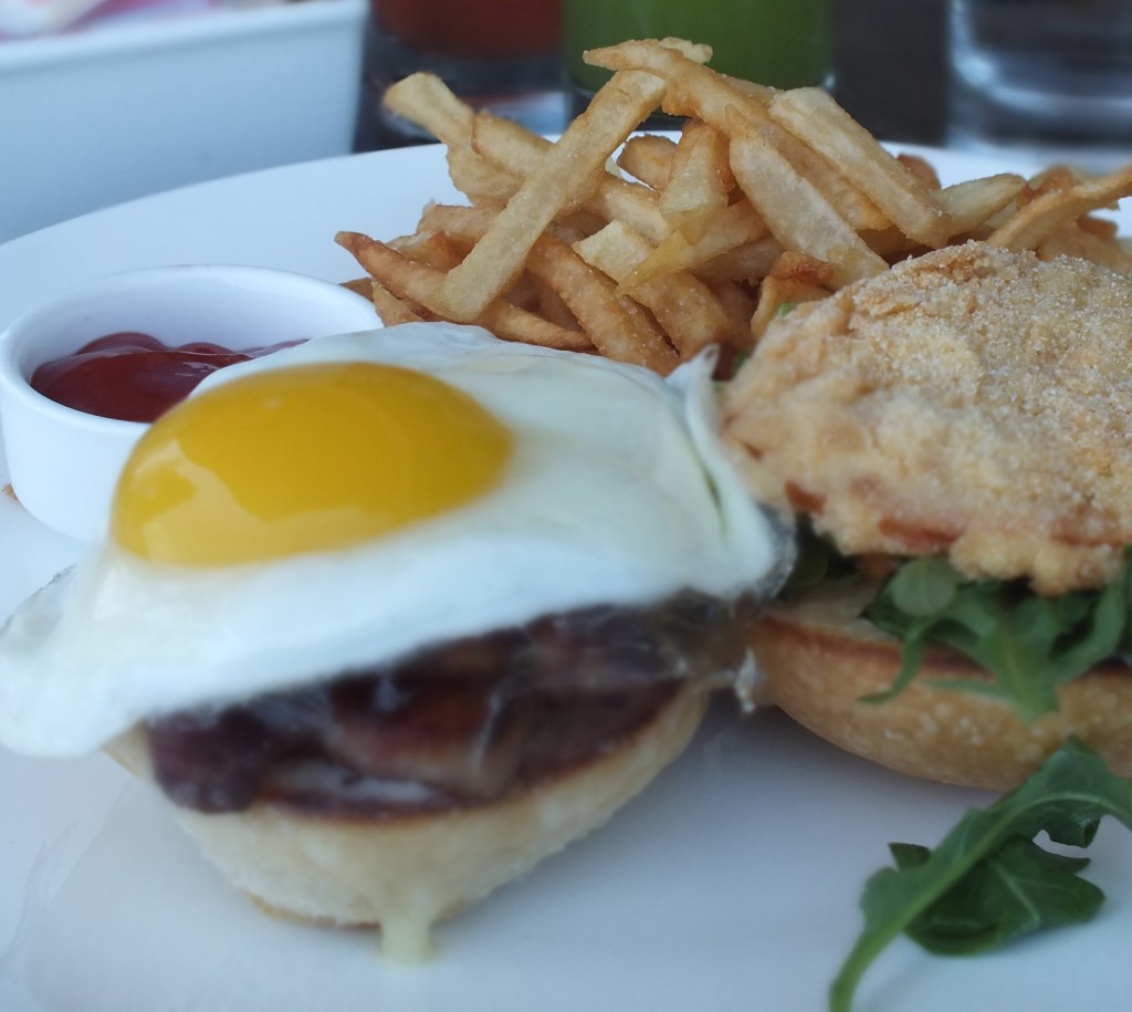 BLT Breakfast Sandwich – pork belly, fried egg*, cheddar, greem tomato, arugula, fries